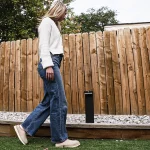 Woman Walking by solar light during the daytime