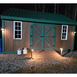 VerLuce solar outdoor lights on a shed at night