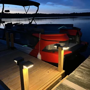 VerLuce solar wall lights on a dock at dusk